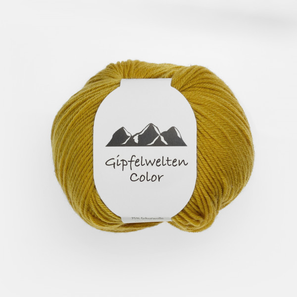 “Gipfelwelten Color” 13 brass, 50 gr balls – 75 % Merino wool extra fine/25 % Polyamide